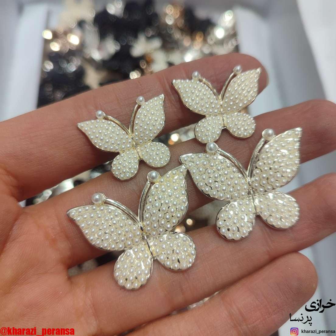 دکمه پینترستی استیل و رنگ ثابت پروانه سفید